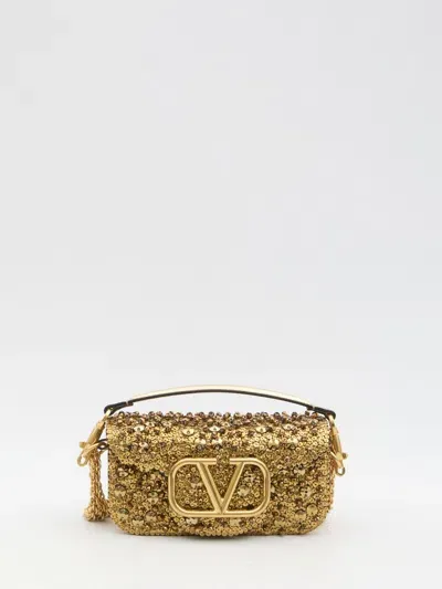 Valentino Garavani Locò Small Shoulder Bag In Brown