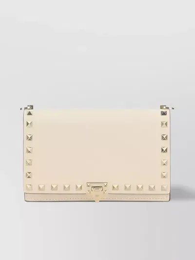 Valentino Garavani Rockstud Leather Clutch In Ivory