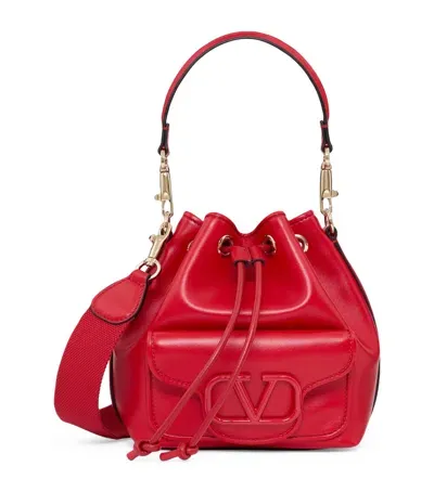 Valentino Garavani Small Leather Locò Bucket Bag In Red