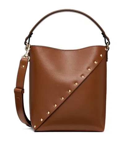 Valentino Garavani Small Leather Rockstud Wispy Bucket Bag In Tobacco