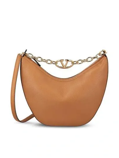 Valentino Garavani Vlogo Moon Beige Medium Hobo Bag In Nude & Neutrals