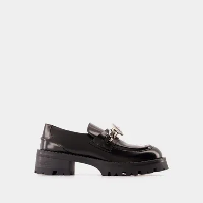 Versace Alia Flat Shoes In Black