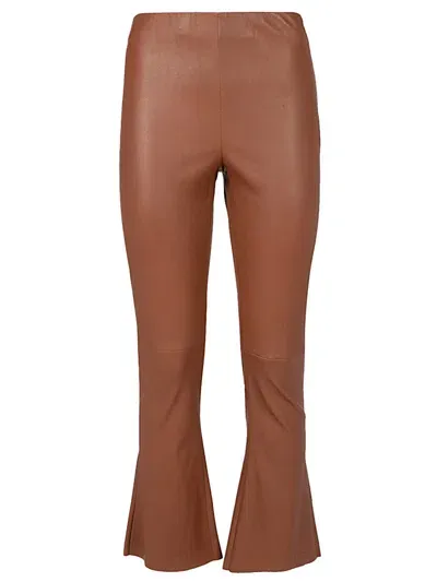 Via Masini 80 Flared Leather Trousers In Red