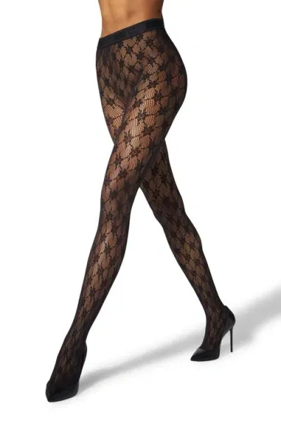 Wolford Rose Floral Fishnet Tights In Black