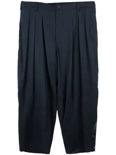 Yohji Yamamoto Graphic-print Pleated Tapered Trousers In Black