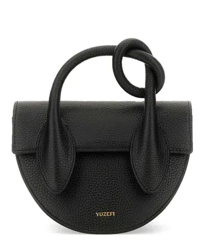 Yuzefi Pretzel Crossbody Bag In Black