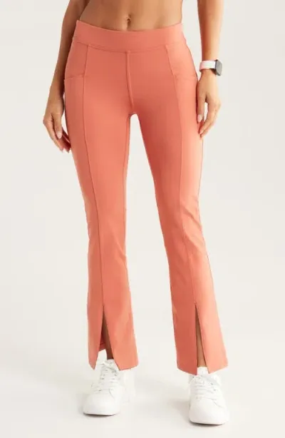 Zella High Waist Kick Flare Pocket Leggings In Rust Redwood