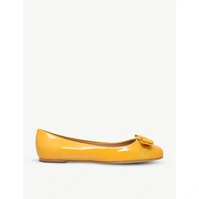 Ferragamo Varina Medallion Yellow Patent Ballerinas