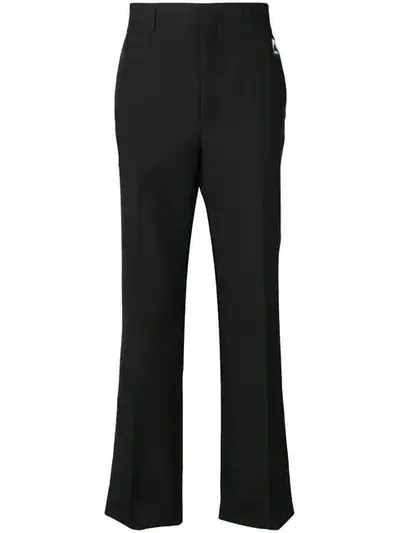 Prada Logo Patch Tailored Trousers In Black