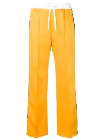 Miu Miu Logo Tape Track Pants In Yellow