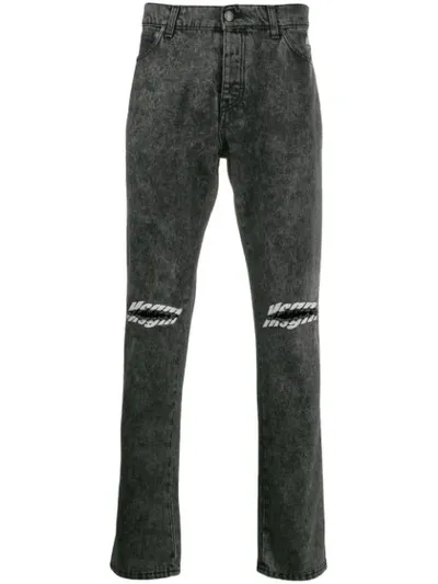 Msgm Logo Print Jeans In Grey