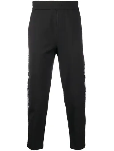 Moschino Logo Trim Track Pants In Black