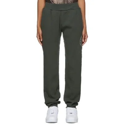 Telfar Logo Print Track Trousers In Off Black