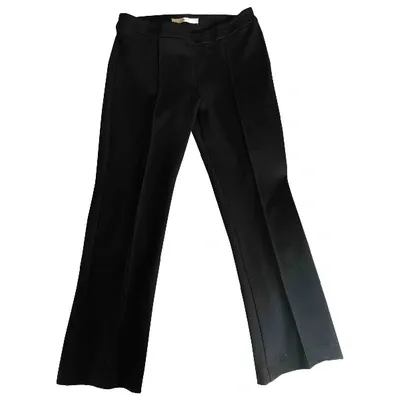 Pre-owned Jucca Wool Trousers In Black