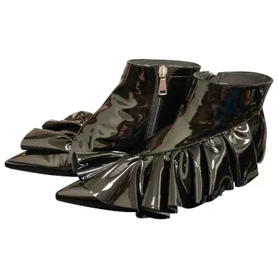 Pre-owned Jw Anderson Patent Leather Ankle Boots In Black