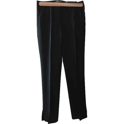 Pre-owned Paule Ka Trousers In Black