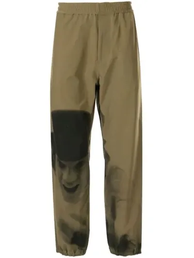 Undercover A Clockwork Orange Print Track Pants In Green