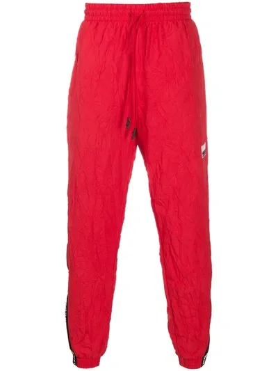 Puma Logo-tape Crinkle Track Pants In Red