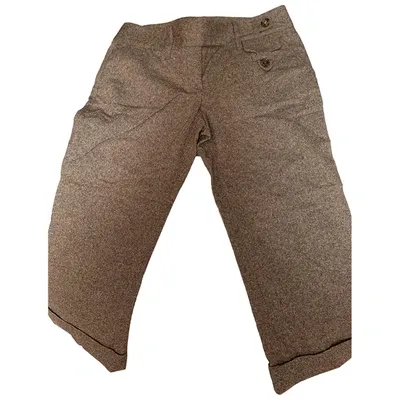 Pre-owned Dolce & Gabbana Wool Trousers In Brown