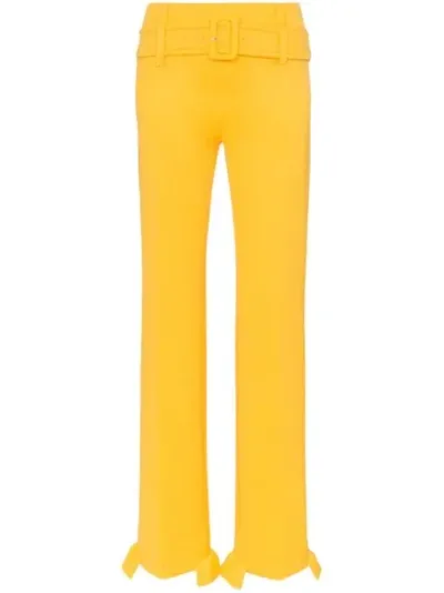 Prada Belted Ruffle-trimmed Scuba Straight-leg Pants In Yellow