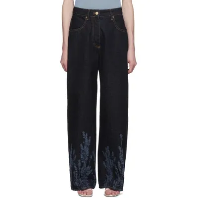 Jacquemus Nîmes Laser Print Jeans In Navy