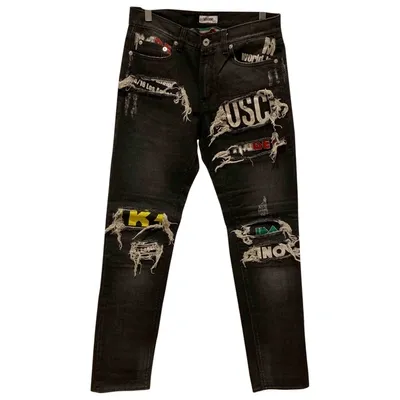 Pre-owned Moschino Straight Jeans In Black