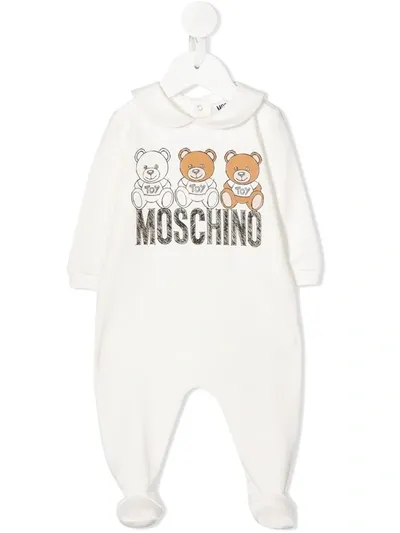 Moschino Logo Print Long Baby-romper In Panna