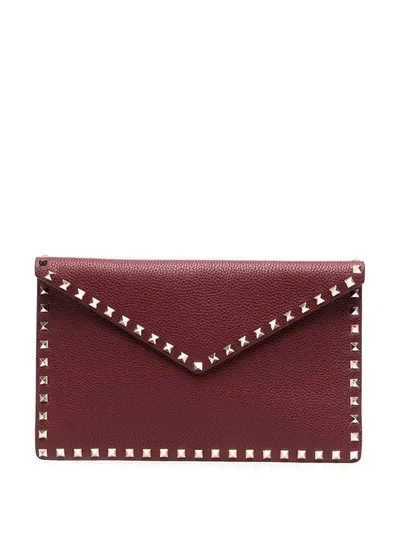 Valentino Garavani Rockstud Grained Leather Envelope Clutch In Red