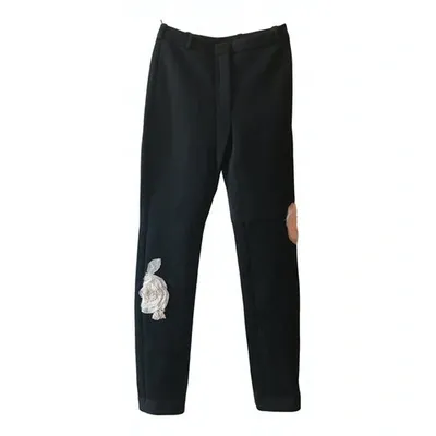 Pre-owned Lanvin Wool Trousers In Black