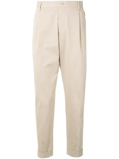 Etro Pleated Cotton Tapered Trousers In Neutrals