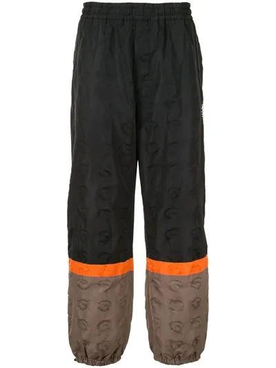 Undercover Panelled Logo Print Track Trousers In Black