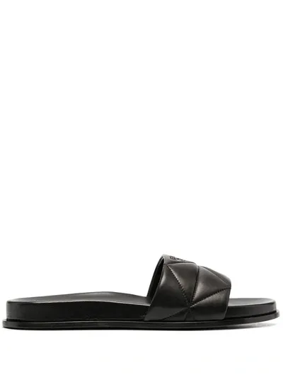 Prada Debossed Logo Slides In Black