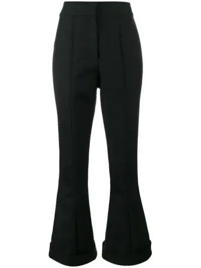 Jacquemus Flared Wool And Cotton-blend Trousers In Black