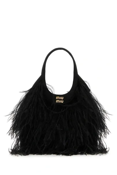 Miu Miu Handbags. In Black