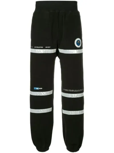 Undercover Astronautics Agency Patch Track-pants In Black