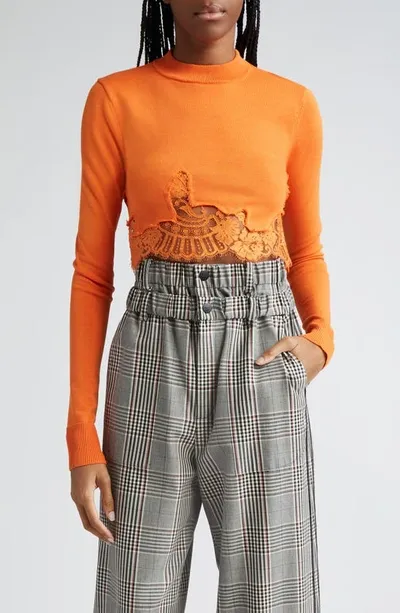 Monse Lace Hem Crop Mock Neck Sweater In Orange